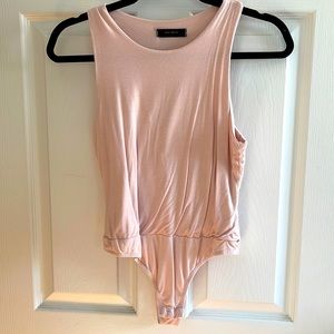 Light pink bodysuit - never worn